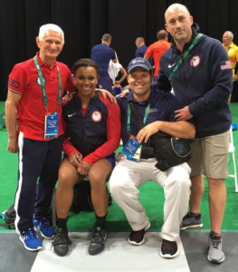 Inspired by sports, Palmer alum Perrry Williams, D.C., CCSP, DABSP (second from the right) helps U.S. athletes achieve their dreams at the Olympic games