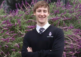 Black Ackerman, Palmer West student, smiling in a Campus Guides sweater.