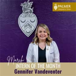 Gennifer Vandeventer, Palmer Florida intern in white clinic coat in front of purple wall.