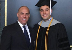 Steven Saro, D.C. with son Harrison Saro in graduation gown