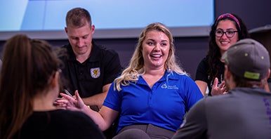 student ambassador speaking with students.