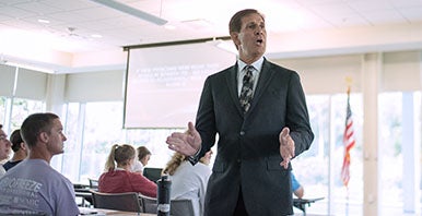 Palmer researcher teaching a class of students.