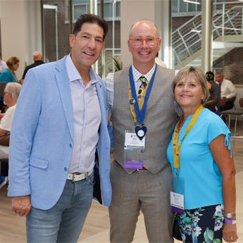 Alumni networking at Palmer Homecoming events.