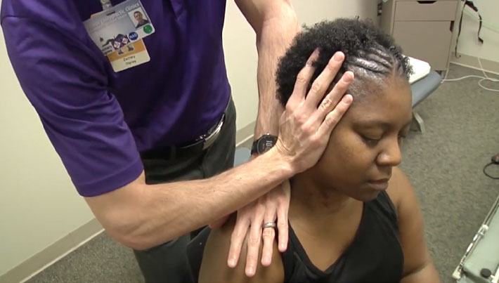 Chiropractic patient receiving an adjustment.