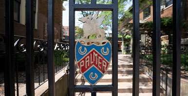Palmer Crest on the gates to the Palmer Family residence on the Palmer College campus.