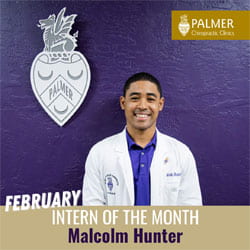 Malcolm Hunter smiling in white clinic coat.