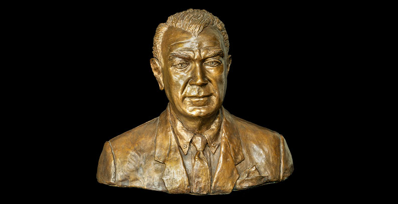 Small bronze bust of Dr. Dave Palmer.