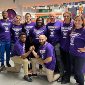 Group of students in purple shirts