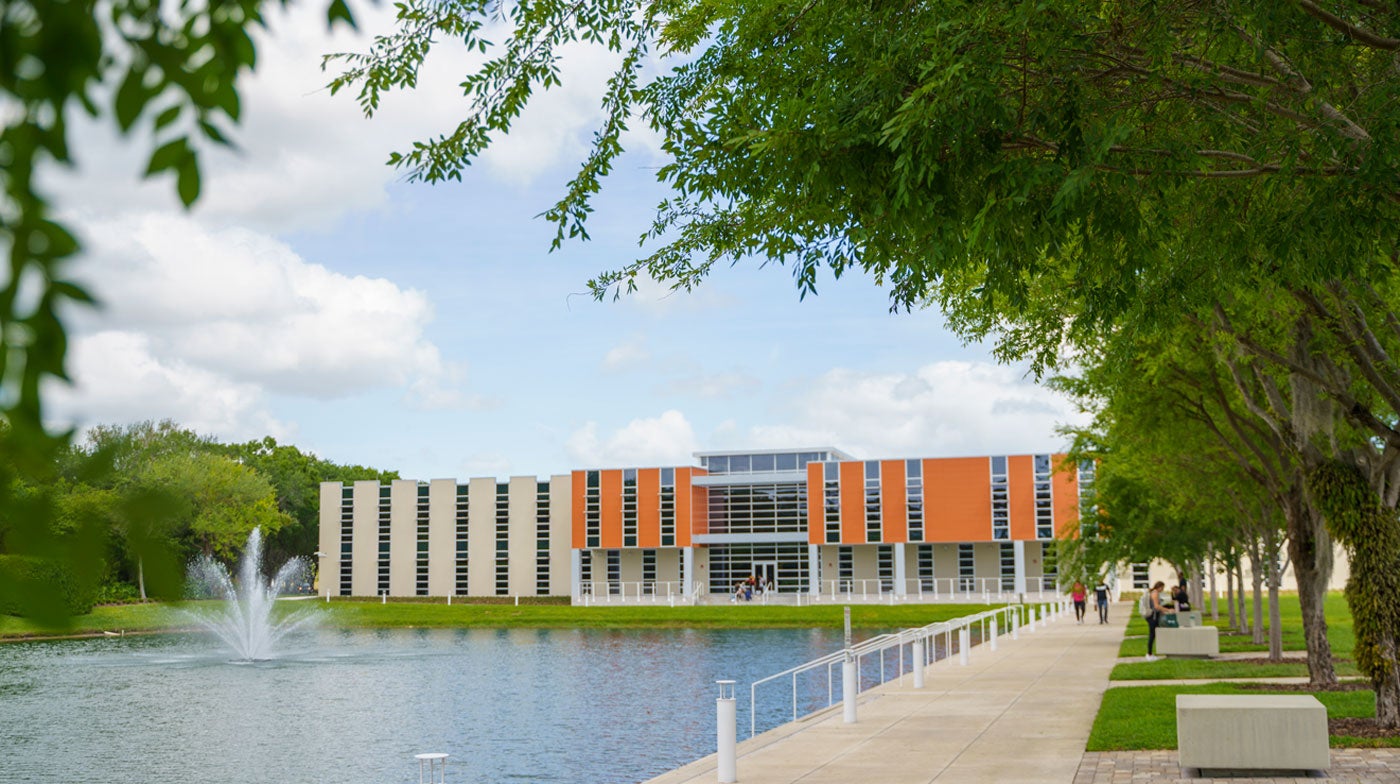 Beauty shot of Palmer Florida's new Building 4 and lake.