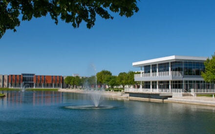 Overview photo of buildings and lake on Palmer Florida campus.