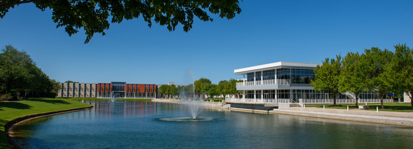 Overview photo of buildings and lake on Palmer Florida campus.