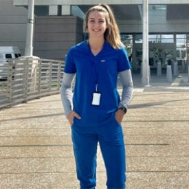 Palmer Florida student Brittany Pase in front of VA facility.