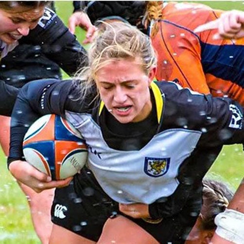 Dr. Emily Diaz in rugby tournament.