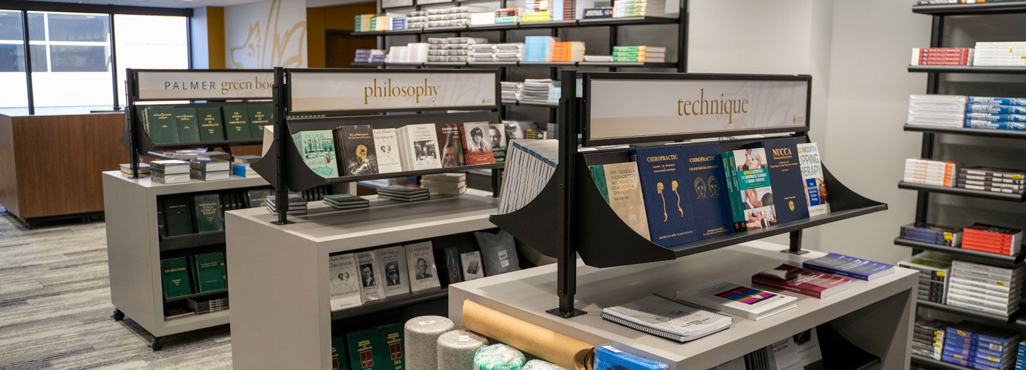 Rows of books for sale in the Campus Store.