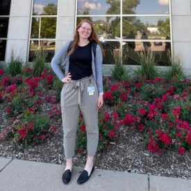 Brittney Pila-Hopkins in front of Clinic.