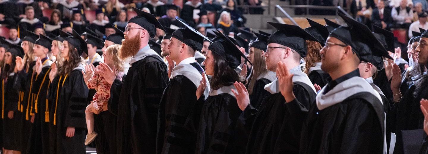 Palmer Main Campus graduating class in cap and gowns.