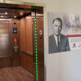 David Palmer display next to elevator at EICC.