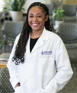 Raya Williams in white clinic coat.