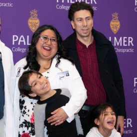 Melissa Padilla and family during the Clinic Induction Ceremony.