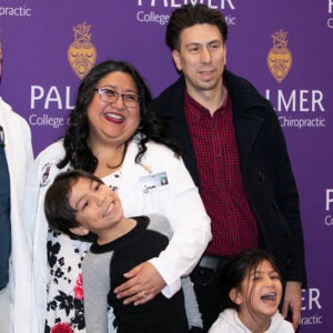 Melissa Padilla and family during the Clinic Induction Ceremony.
