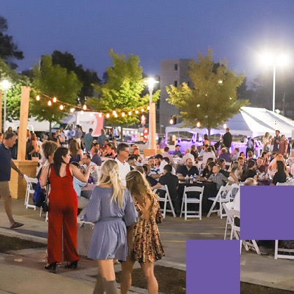 Students and alumni enjoy the Homecoming closing festival.