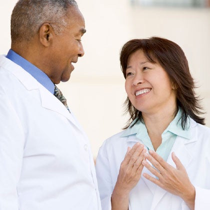 Two clinic docs talking.