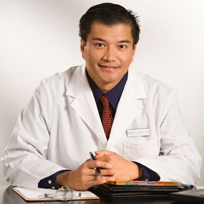 Doctor in white coat.