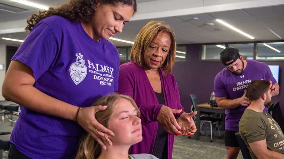 Dr. Payton advising student in technique class.