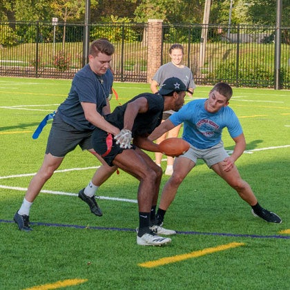 Students playing flag football on the Recreation Field.