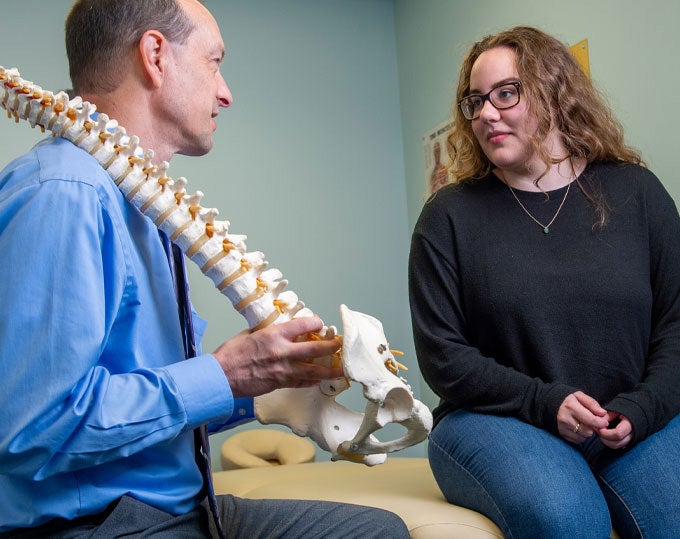 Dr. Vining speaking with patient.