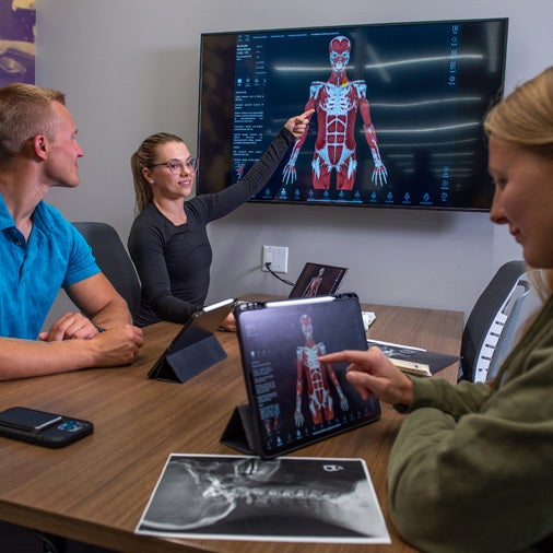 The library offers several group study areas for students to reference digital models.