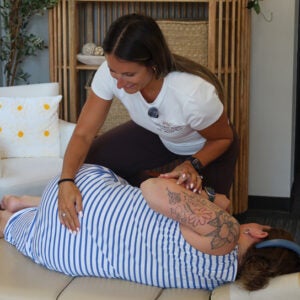 Dr. Bianca Prentis adjusting a patient.