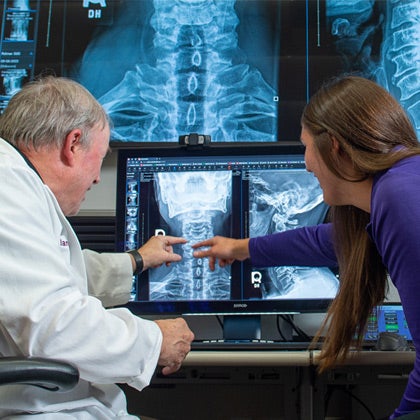 Palmer Students learn to read X-rays.